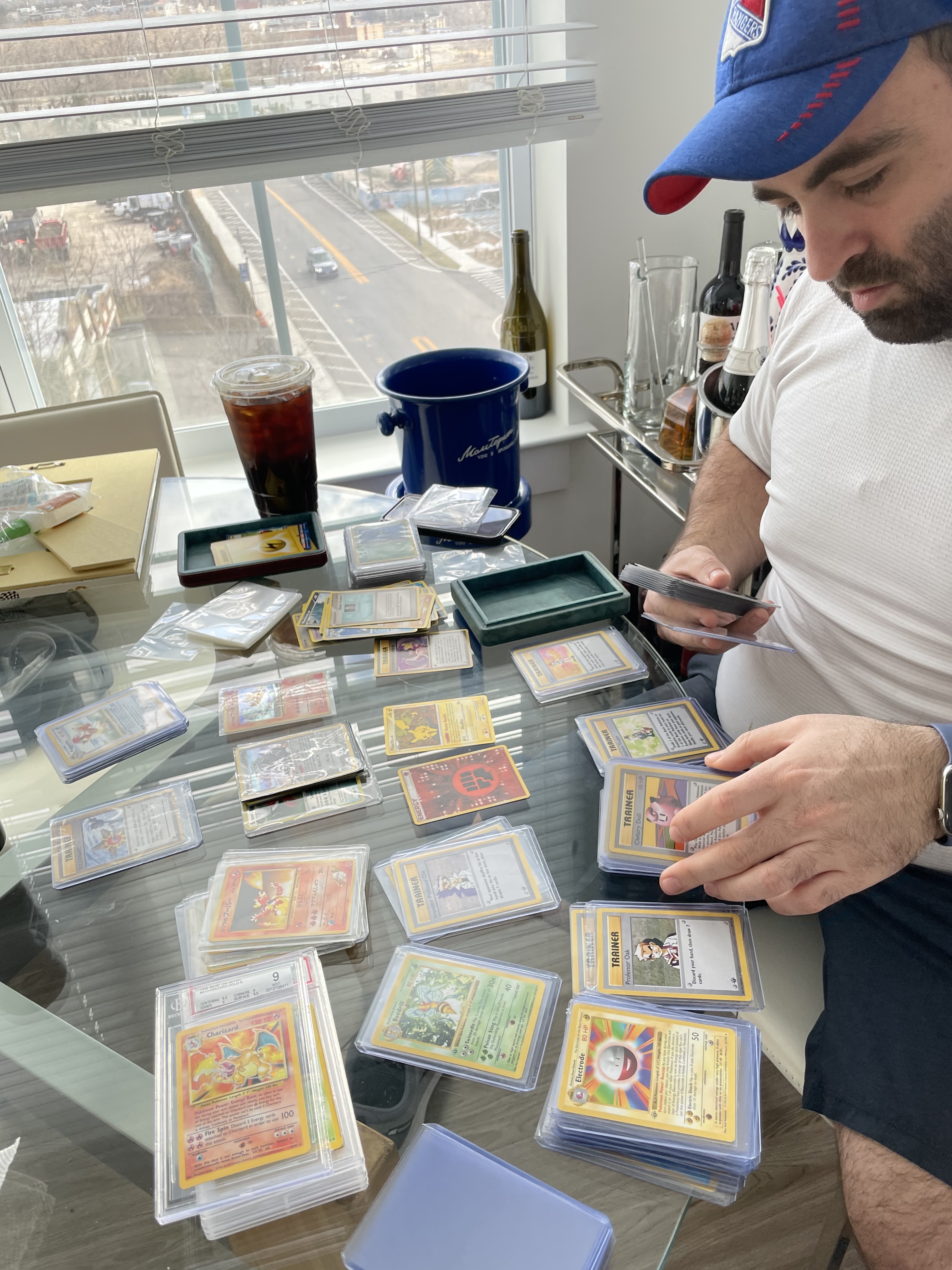 Will sorting through his Pokémon collection